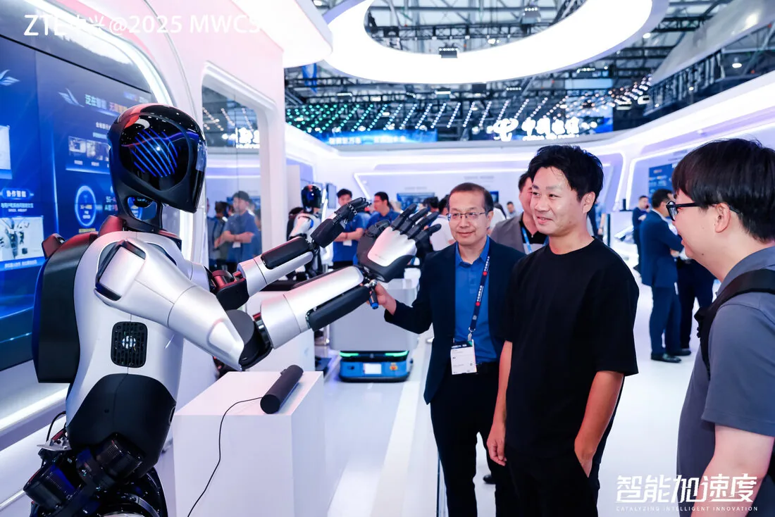 A2 Ultra shaking hands with a visitor at the ZTE booth during MWC Shanghai 2025